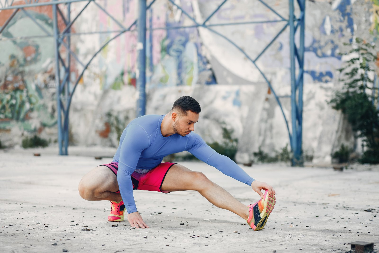 Athlete holding a low mobility stretch